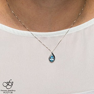 10K White Gold Blue Topaz Necklace