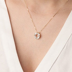 10K Yellow Gold Diamond & White Sapphire Circle Pendant